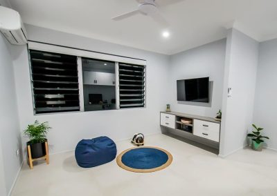 Breezway Louvres with fixed lites for ventilation in the tv room